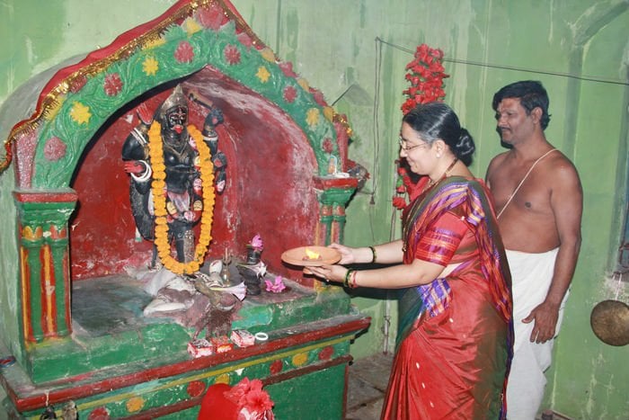 Devotee offering at the temple
