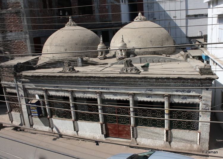 Architectural detail of Binat Bibi Masjid showing terracotta façade