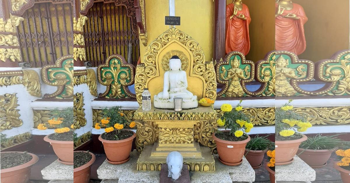 The serene golden Buddha statue inside Buddha Dhatu Jadi